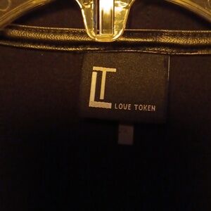 Long sleeveless vest